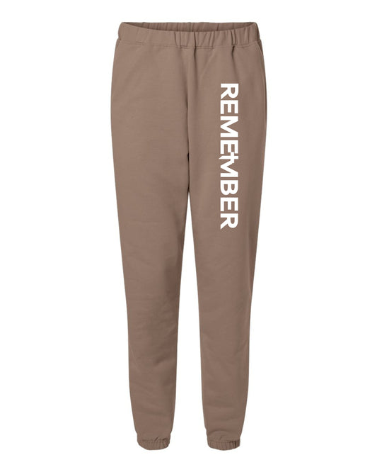 BROWN SWEATPANT WITH THE WHITE REMEMBER PRINT ON THE RIGHT THIGH