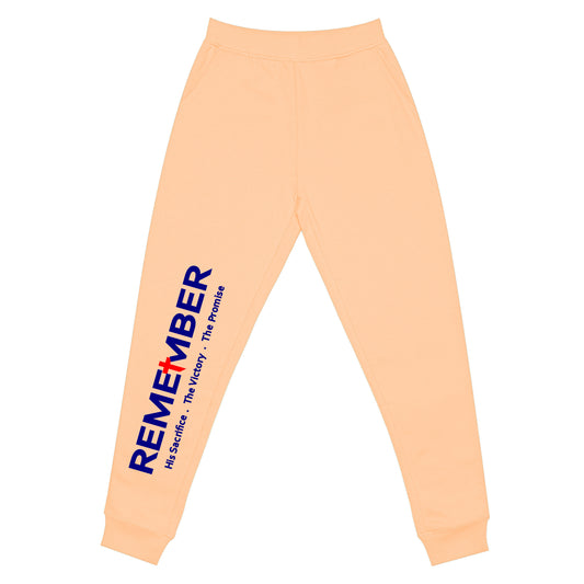 LIGHT ORANGE JOGERS WITH THE RED CROSS ON THE LEFT THIGH