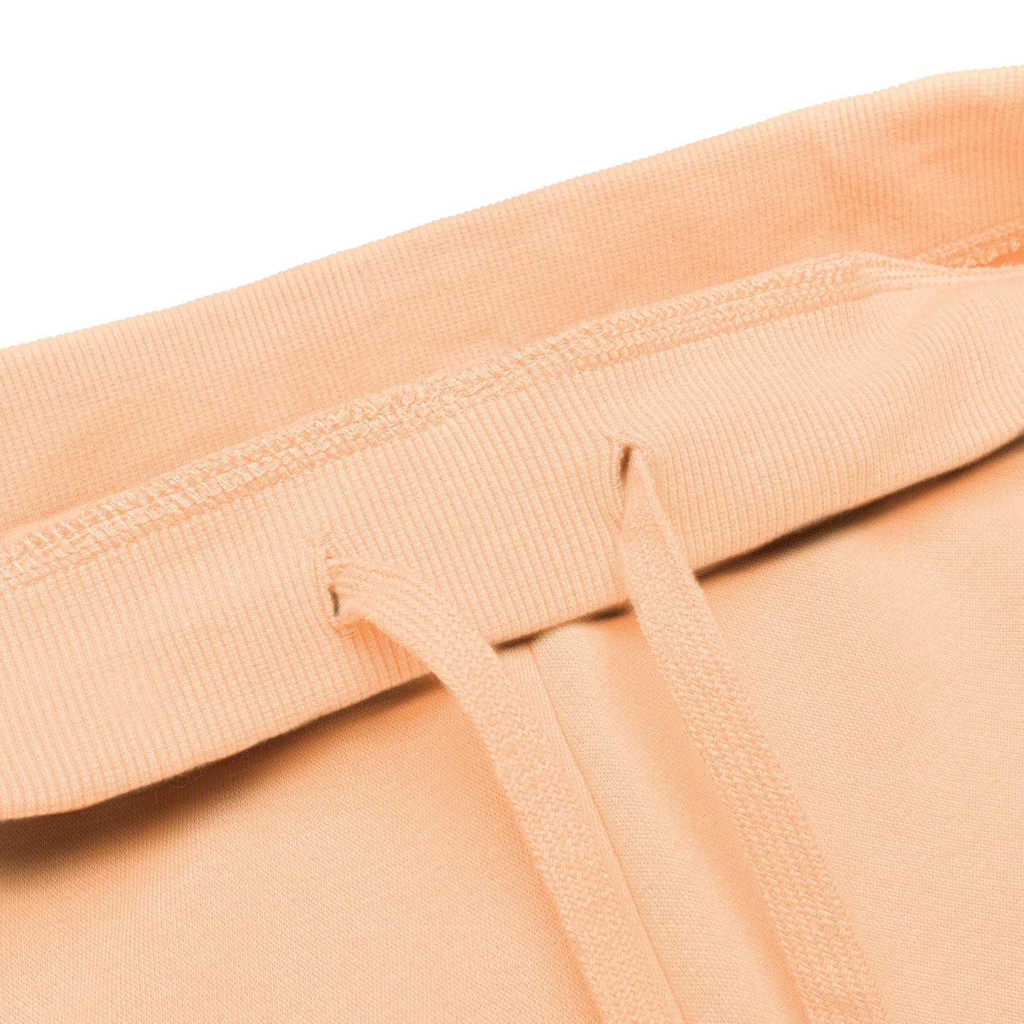 LIGHT ORANGE JOGERS WITH THE RED CROSS ON THE LEFT THIGH